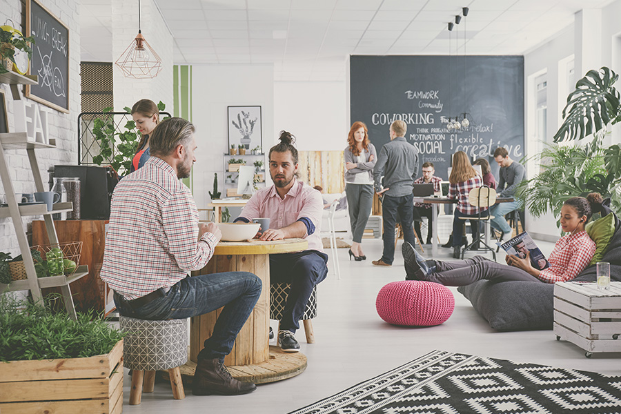 Marketing agency workers having coffee break at comfortable relax zone